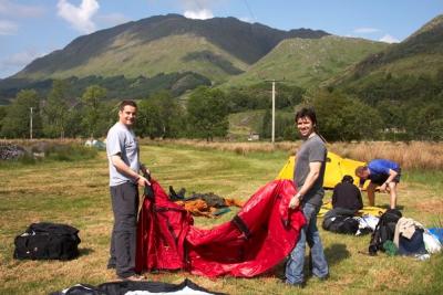 Neil Henn and Gavin Mills try to remember how to erect their tent